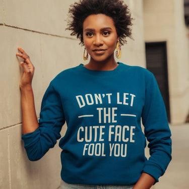 Don't Let The Cute Face Fool You Sweatshirt