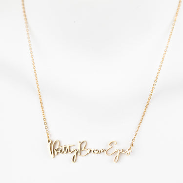 "Pretty Brown Eyes" Script Necklace (18k gold plated)
